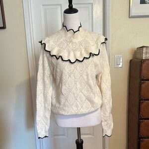 Elegant Ivory Sweater with Black Trim